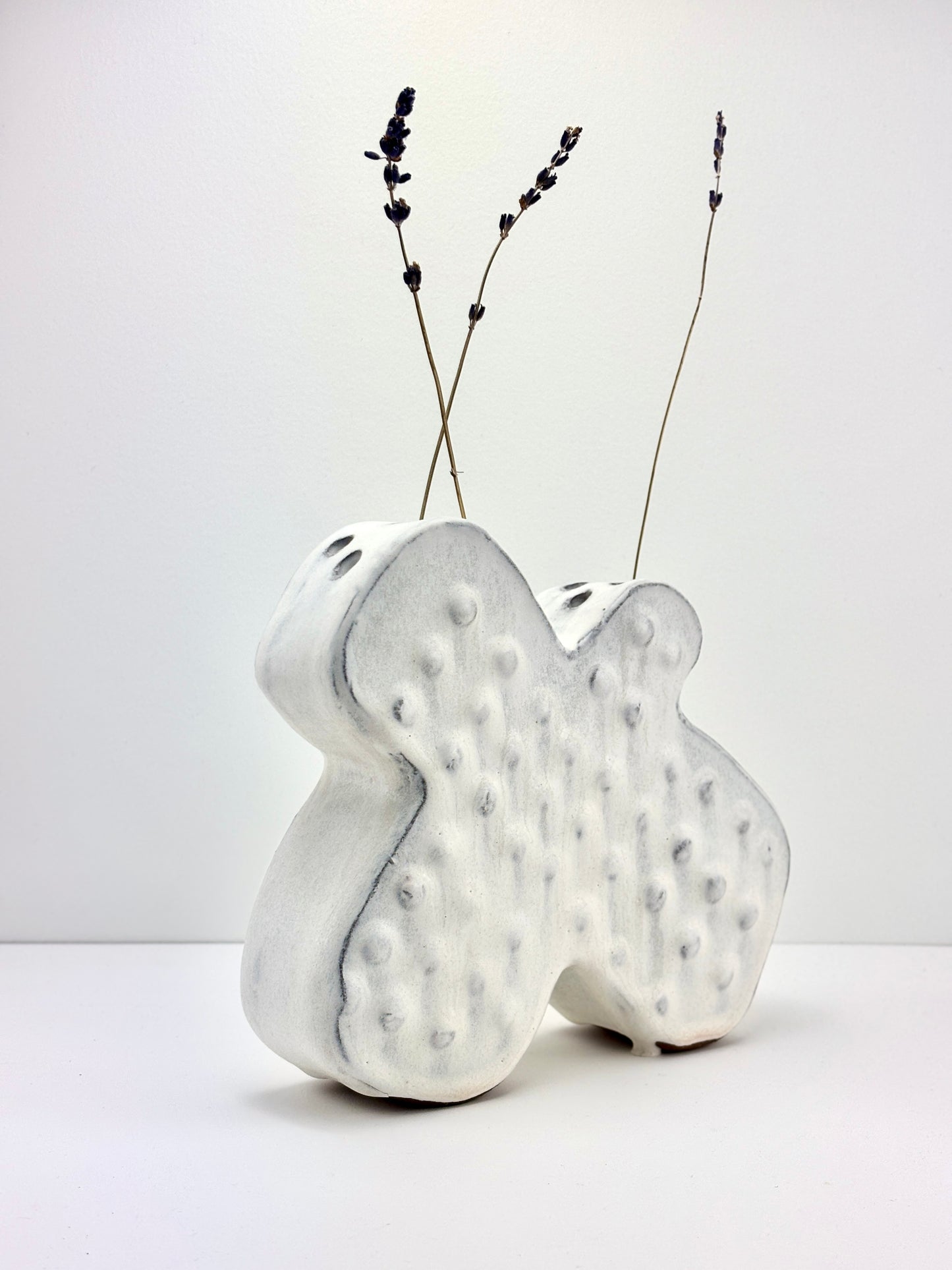 Flower Brick petal shape, dot texture in cumulus glaze