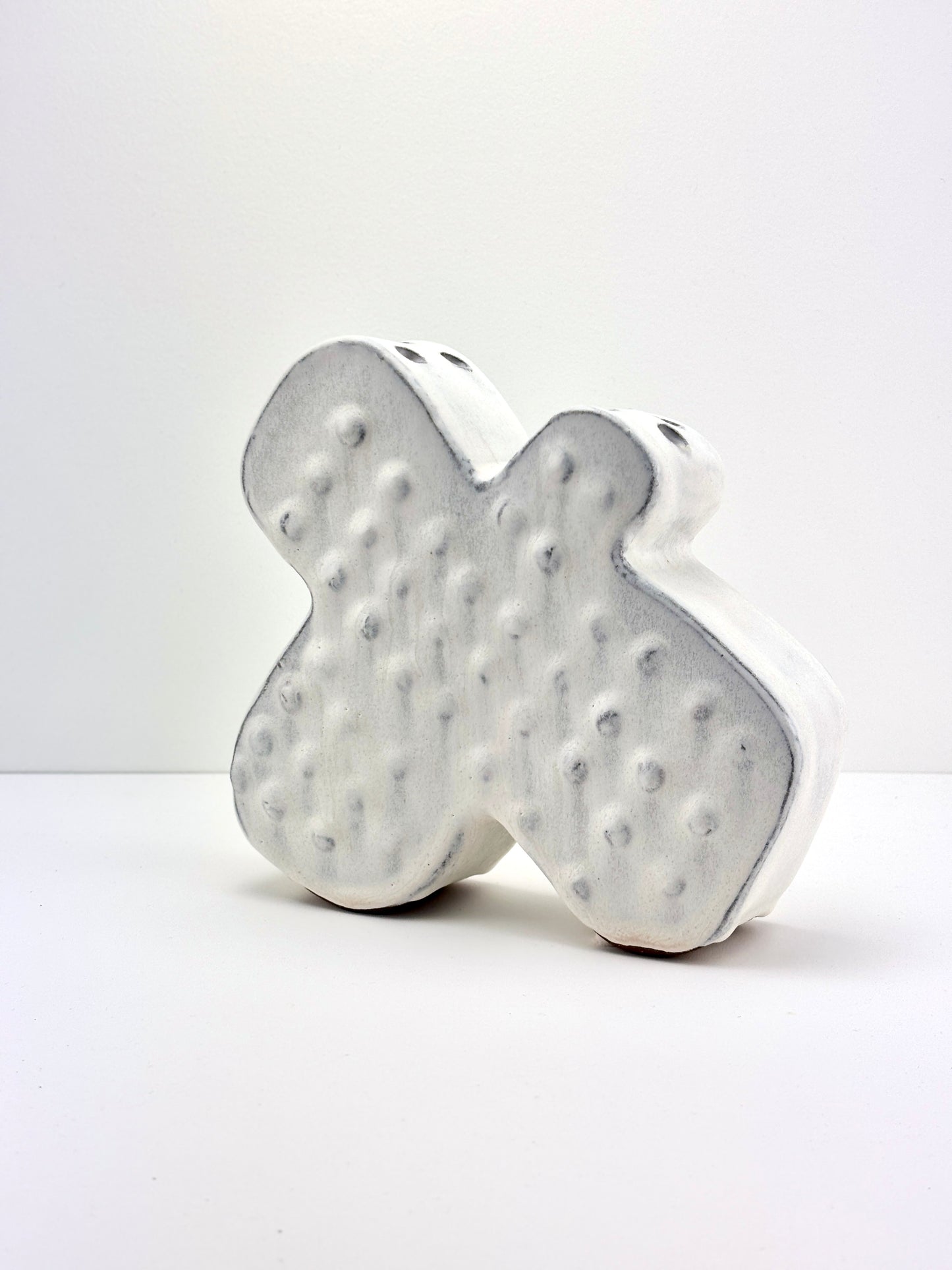 Flower Brick petal shape, dot texture in cumulus glaze