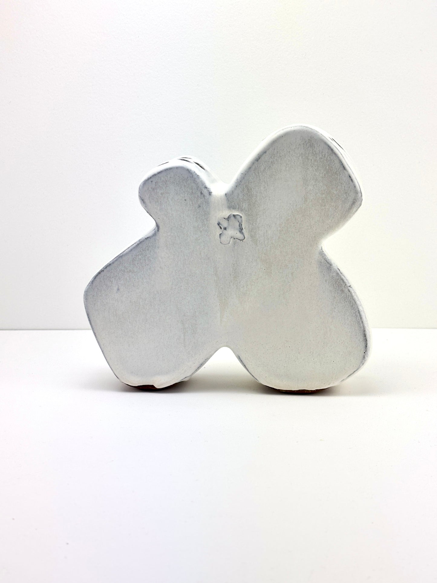 Flower Brick petal shape, dot texture in cumulus glaze